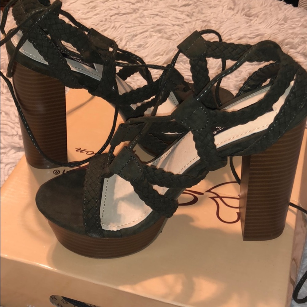 Olive green wooden heels.